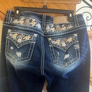 Miss Me Mid Rise Destroyed Inner Glimpse Bootcut Jeans with Faux Flap Pockets